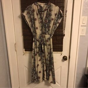 Yumi Button up Cap Sleeve snake skin floral print Dress
